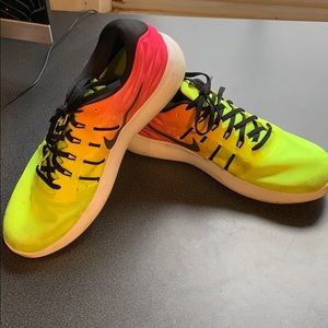 Pink and Yellow Nike Lunarstelos